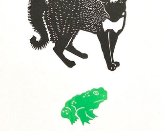 Linocut of a cat and a toad