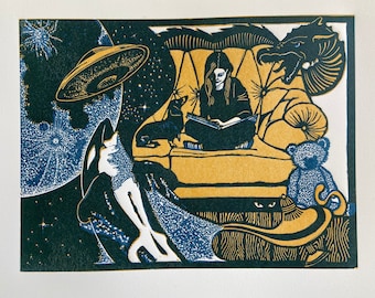 Linocut print of  girl reading