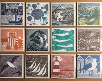 Paquete de 12 tarjetas con temática costera.