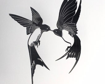 Linocut print of two flying Swallows