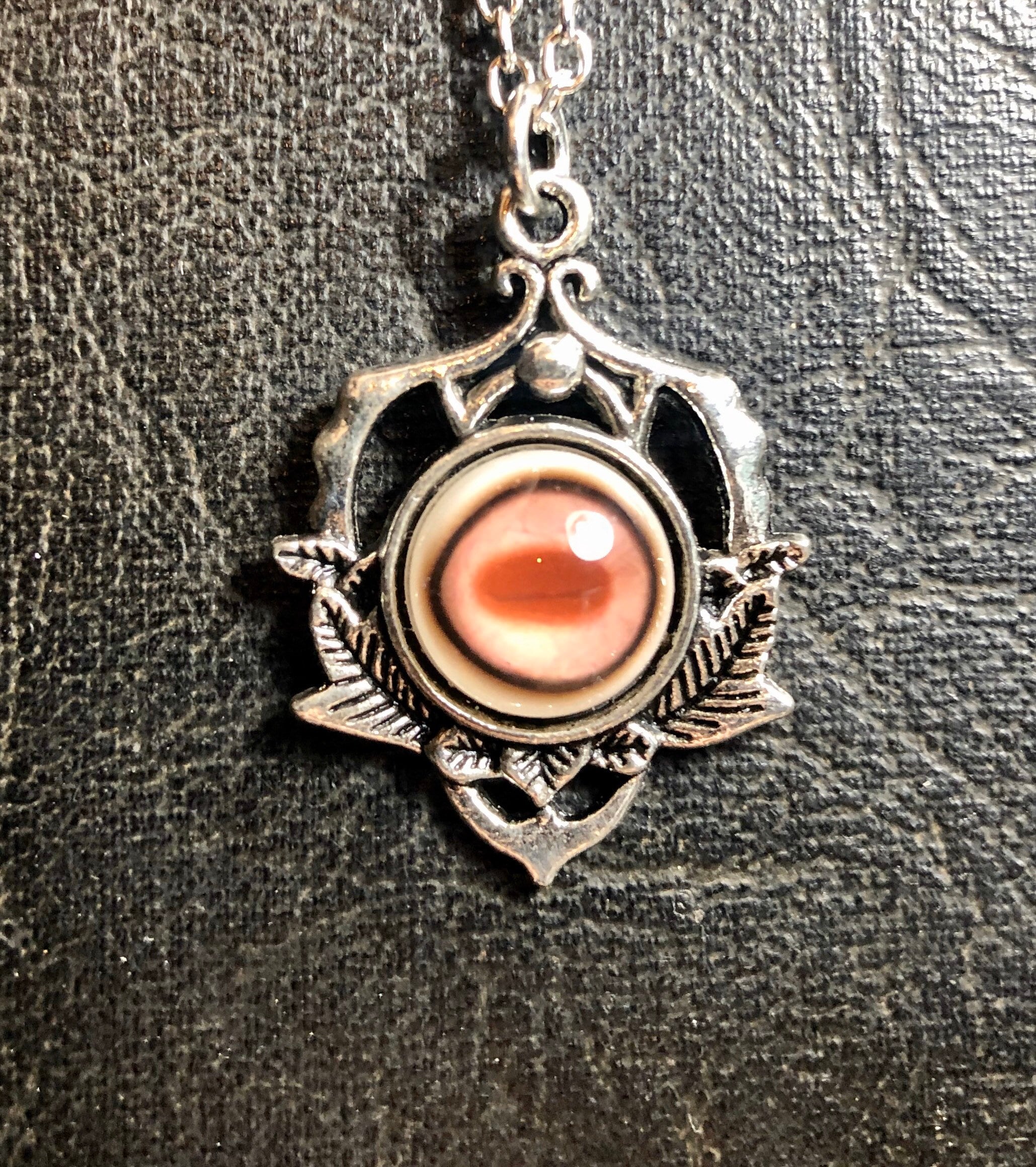 Albino Deer Pink Red Eye Taxidermy Acrylic Goat Eye Necklace Horizontal Pupil Taxidermist Whites Eyeball Druid Leaves Bezel