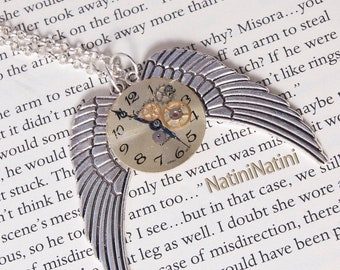 Winged steampunk clock face