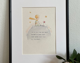 May include: A watercolor illustration of The Little Prince sitting on an asteroid with a rose in a glass dome. The quote "It is the time you have wasted on your rose that makes your rose so important." is written below the illustration.