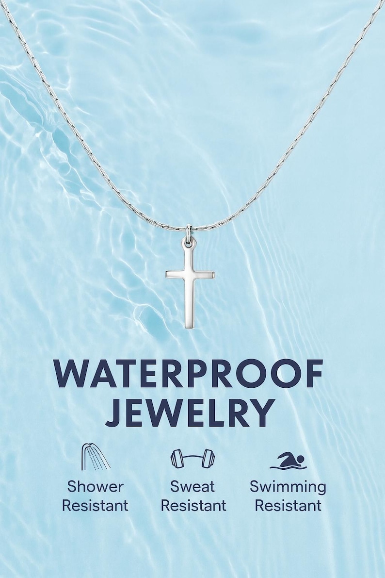 May include: A silver-toned cross pendant on a delicate chain. The text WATERPROOF JEWELRY appears below, followed by three icons representing shower, sweat, and swimming resistance with the labels Shower Resistant, Sweat Resistant, and Swimming Resistant.