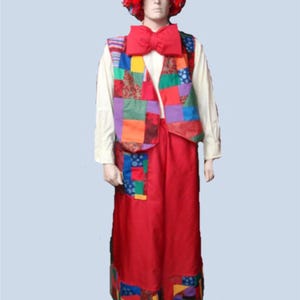 May include: A set of three ceramic mugs with a speckled, matte finish. The mugs are in shades of cream, light gray, and dark gray. Each mug has a simple, minimalist design and a rounded handle.