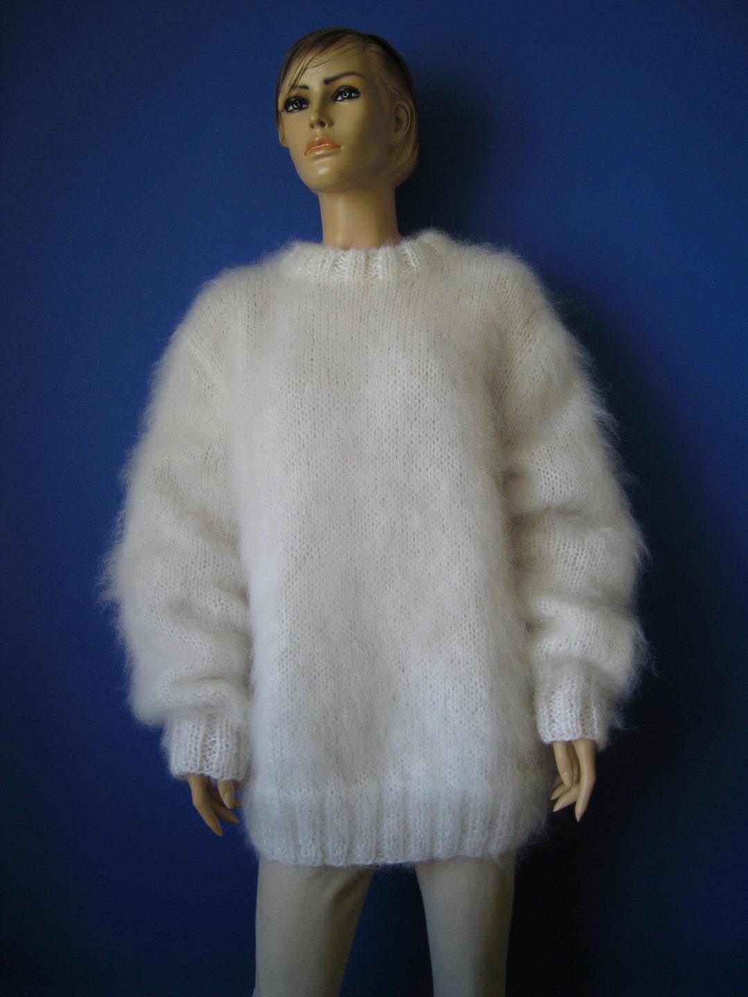 Handmade knitted mohair hand warmers in ombré black, grey and white