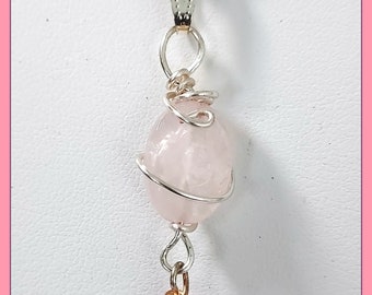 Rose Quartz  Minnie wire wrapped pendant corded on 1 mm black Satin Cord. Non tarnish silver wire, Small Lobster claw clasp.