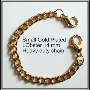 May include: Gold plated lobster clasp chain with a 14 mm lobster clasp.  Small Gold Plated Lobster 14 mm Heavy duty chain