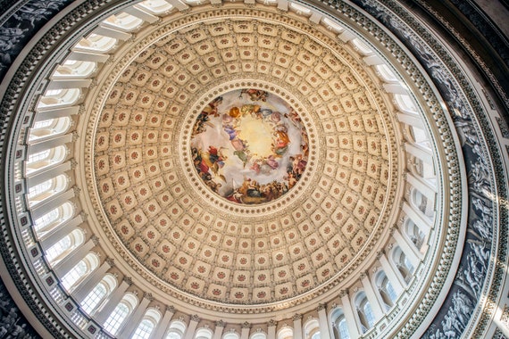 Zoom of picture of a coin or a banknote for currency USD (United States  Capitol)