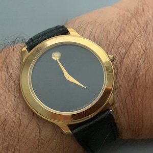 Swiss movado quartz watch fake best sale