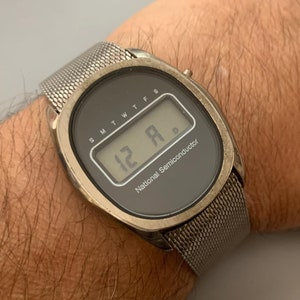 Rare Vintage NATIONAL SEMICONDUCTOR Mens Watch Oval Case Black Dial | LCD Digital Display | Mesh Watch Band | Runs Well Ships Free!