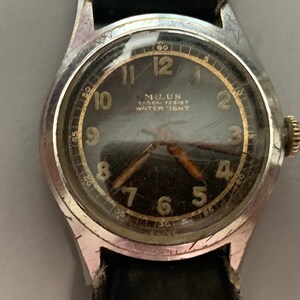 Milus RM107 Psychedelic Dial - Montre Vintage à Remontage Manuel Des Années 70 - NOS Neuf
