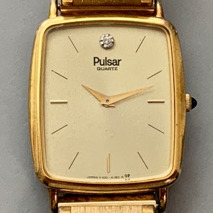 Pure Perfection PULSAR Mens Vintage Gold Plated Rectangular Watch, Quartz Ultra Slim Watch, Golden Dial, See Item Details image 1