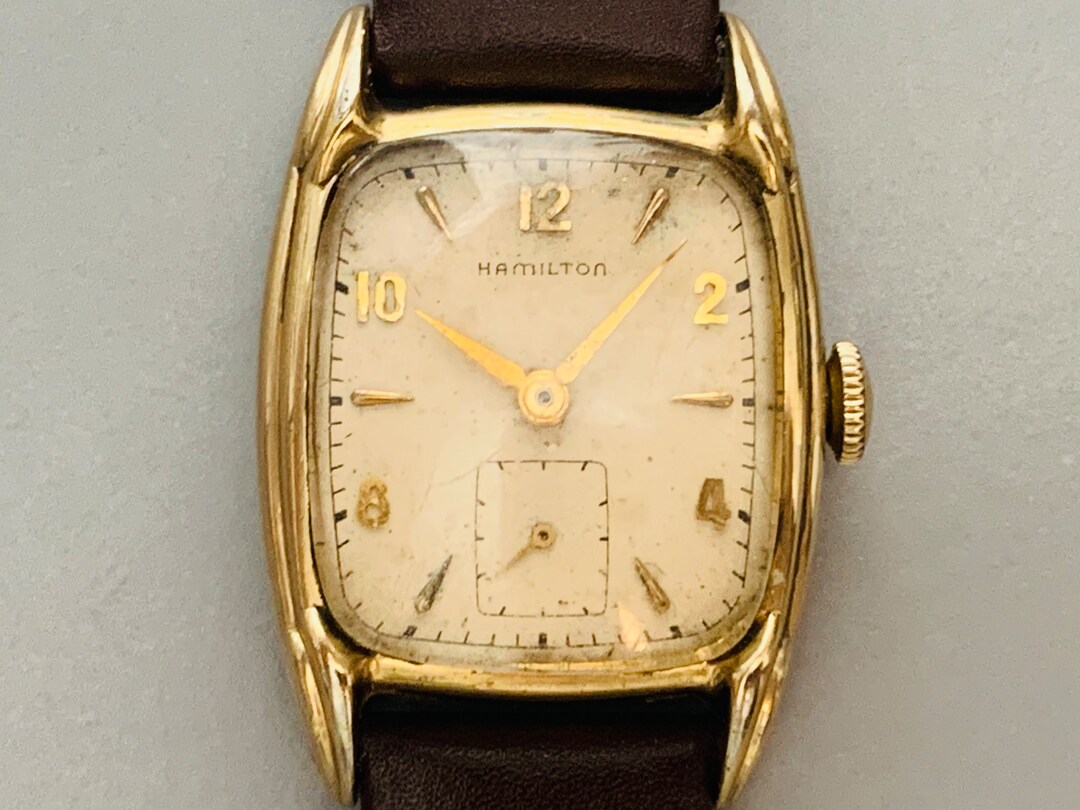 HAMILTON Darrell Tonneau Rectangular 17 Jewel Mens Watch Sub Second Hand 10K Gold Fill V Go to item Details learn More About This Item Etsy Canada