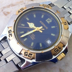 Xonix watch deals 100m price