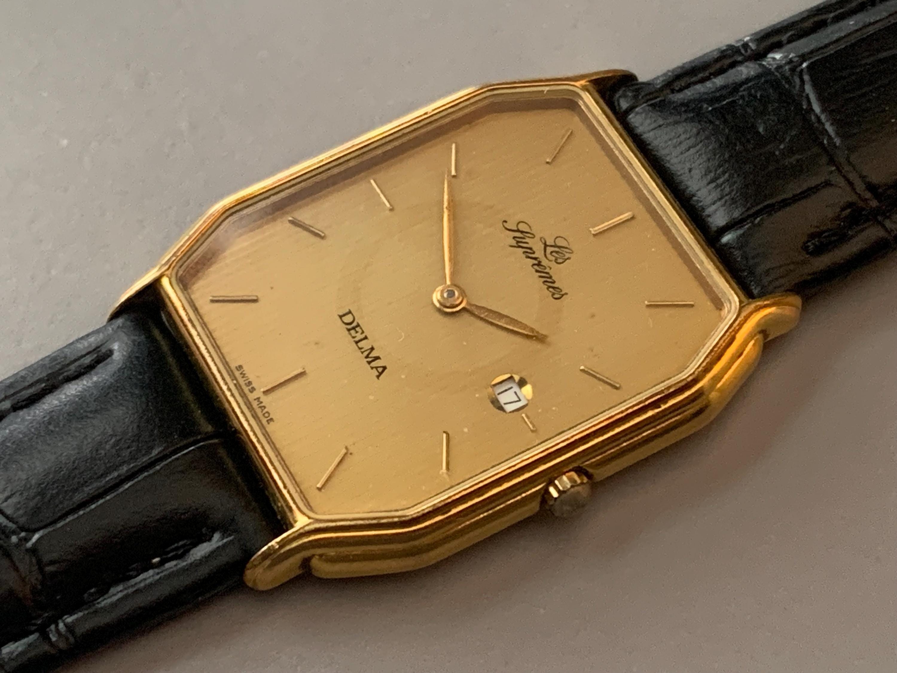 Mens Delma Les Supremes Watch: 18K Gold Plate Swiss Click & Read 