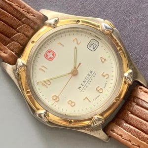 Vintage Wenger Swiss Army Knife Watch: White Dial, Gold Plated Bezel
