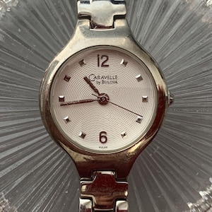 Vintage Bulova Caravelle Women&#39;s Watch: White Dial, Stainless Steel, Quartz