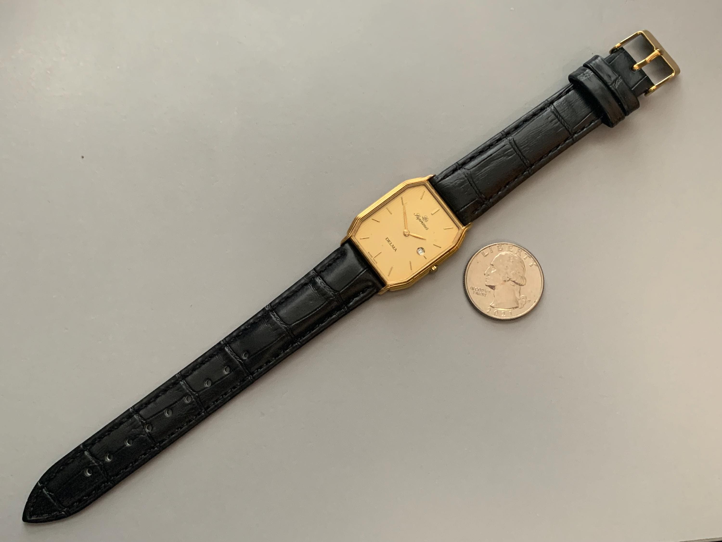 Mens Delma Les Supremes Watch: 18K Gold Plate Swiss Click & Read 