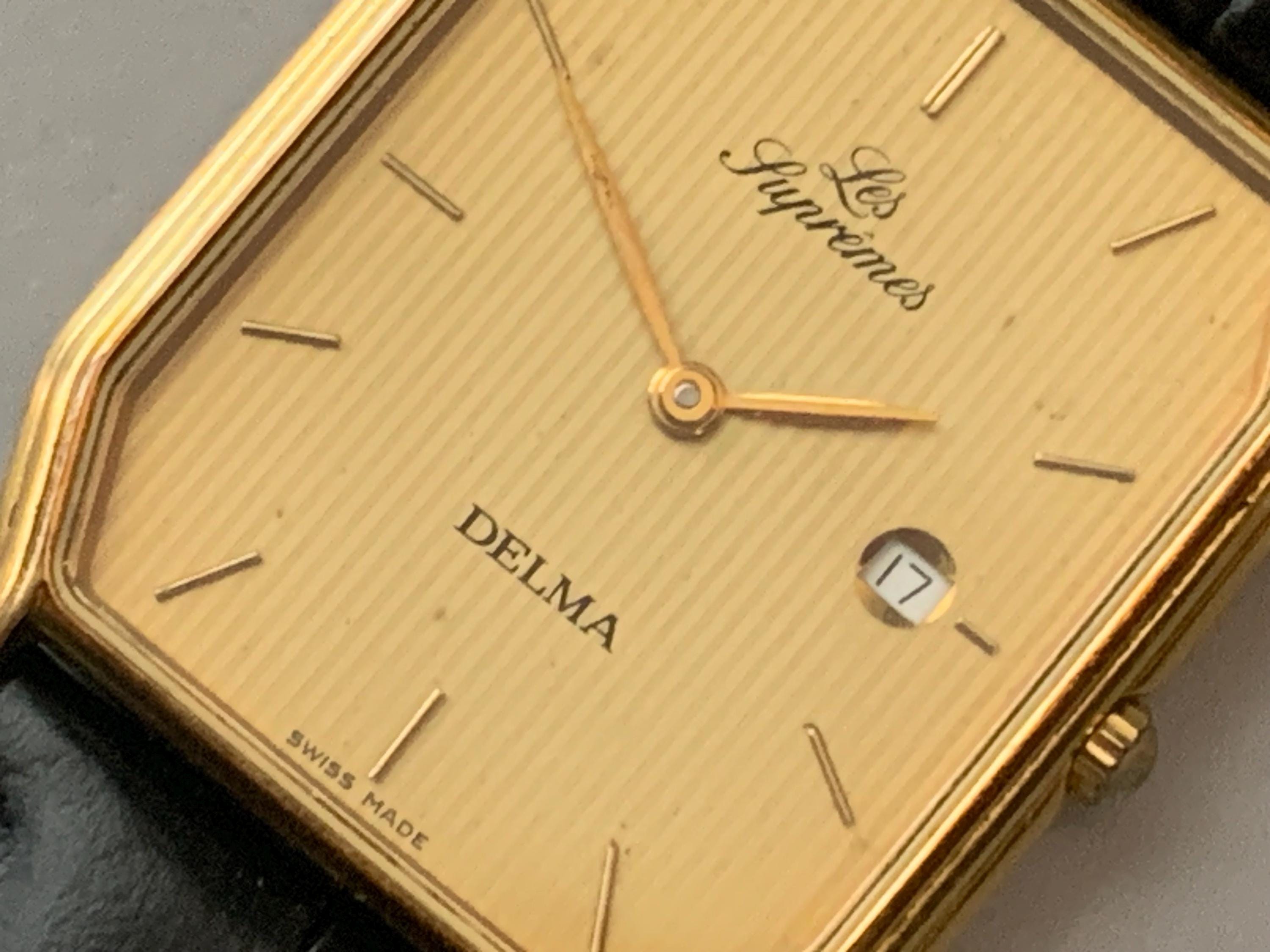 Mens Delma Les Supremes Watch: 18K Gold Plate Swiss Click & Read