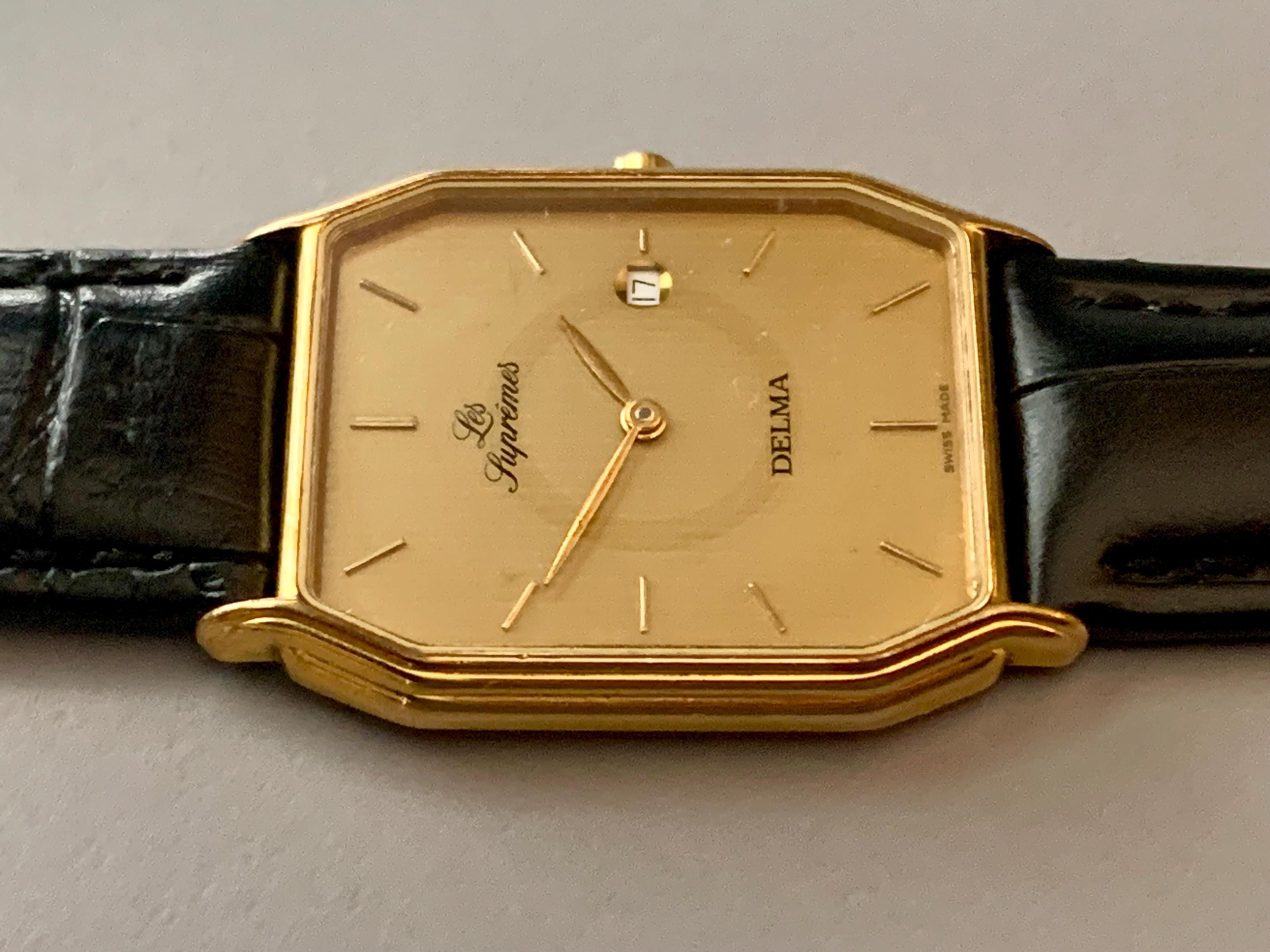 Mens Delma Les Supremes Watch: 18K Gold Plate Swiss Click & Read