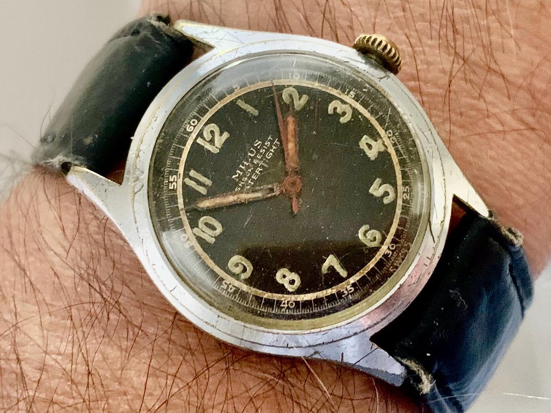 Clearance Watches Milus Paul Junod Mens Vintage Milus WWII Military Watch:  Swiss Made, Black Dial