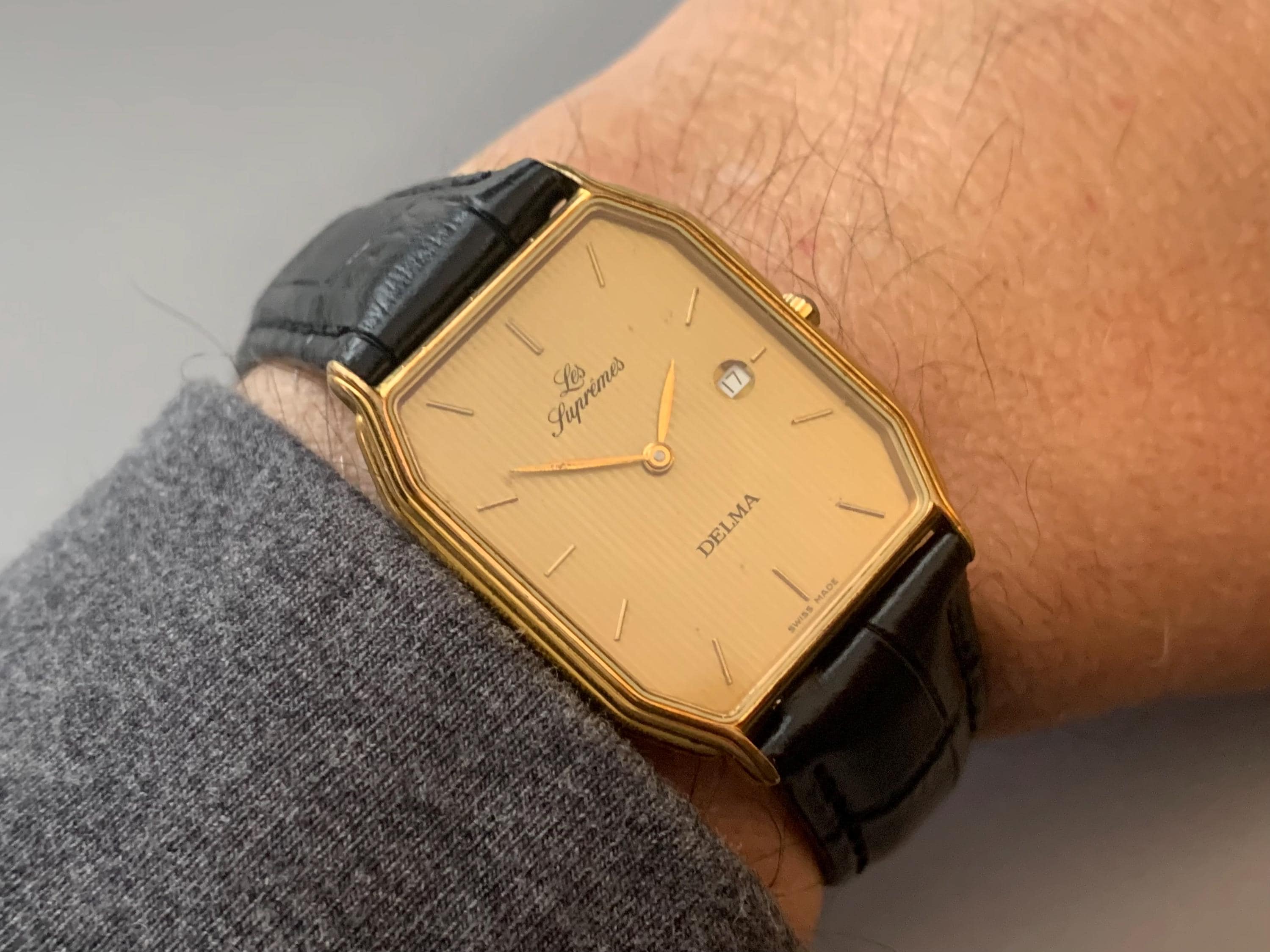 Mens Delma Les Supremes Watch: 18K Gold Plate Swiss Click & Read
