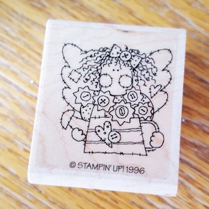 Le tampon ange féerique avec pot d'arrosage et fleurs fait maison n'est plus disponible chez Stampin Up