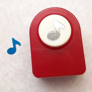 Perforatrice per carta con nota musicale e semiminima