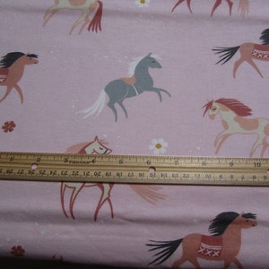 Pink With Multicolored Horses and Pastel Flowers Flannel Fabric  by the Yard