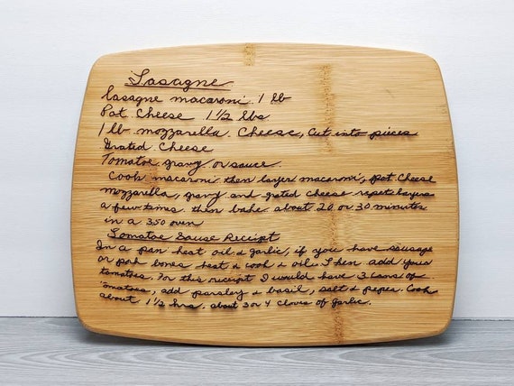 Transfers an actual handwritten family recipe onto a cutting board — the handwriting detail transforms a commodity item into a genuine heirloom.