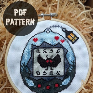 Mothman Tamagotchi Cross Stitch Pattern