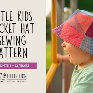 May include: A colorful patchwork bucket hat for kids, with a blue, pink, and red color scheme. The hat is made of fabric and has a wide brim. The text "LITTLE KIDS BUCKET HAT SEWING PATTERN 3 MONTHS - 12 YEARS LITTLE LION PATTERNS - PRINTABLES" is visible on the image.