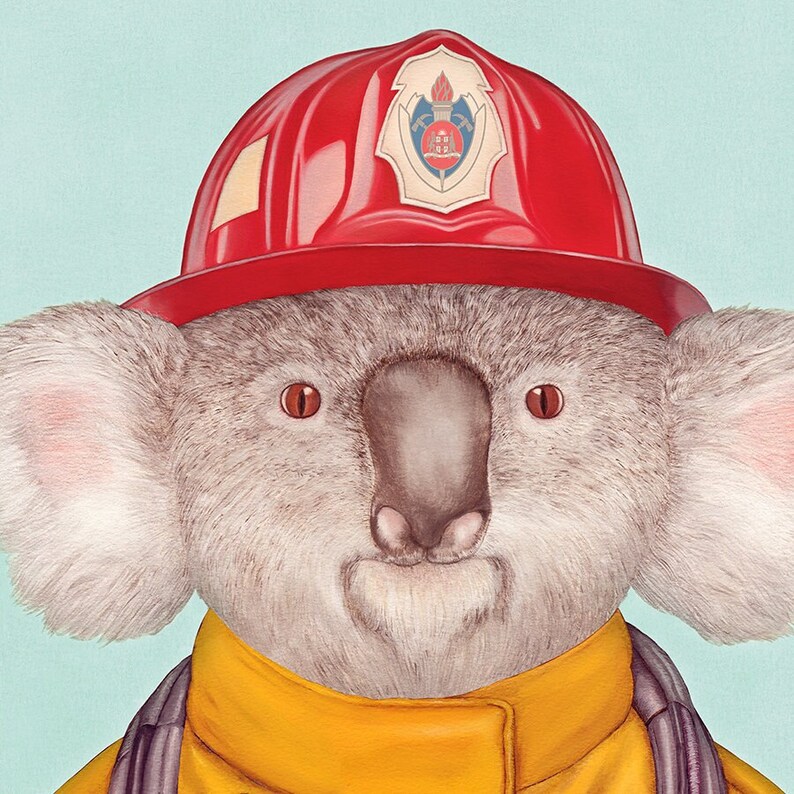 May include: A koala wearing a red firefighter helmet with a gold emblem and a yellow firefighter jacket. The koala has a serious expression on its face.