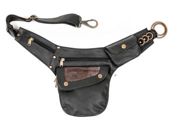 Riñonera de piel negra para mujer, riñonera de festival con detalles dorados, riñonera de viaje con múltiples bolsillos.