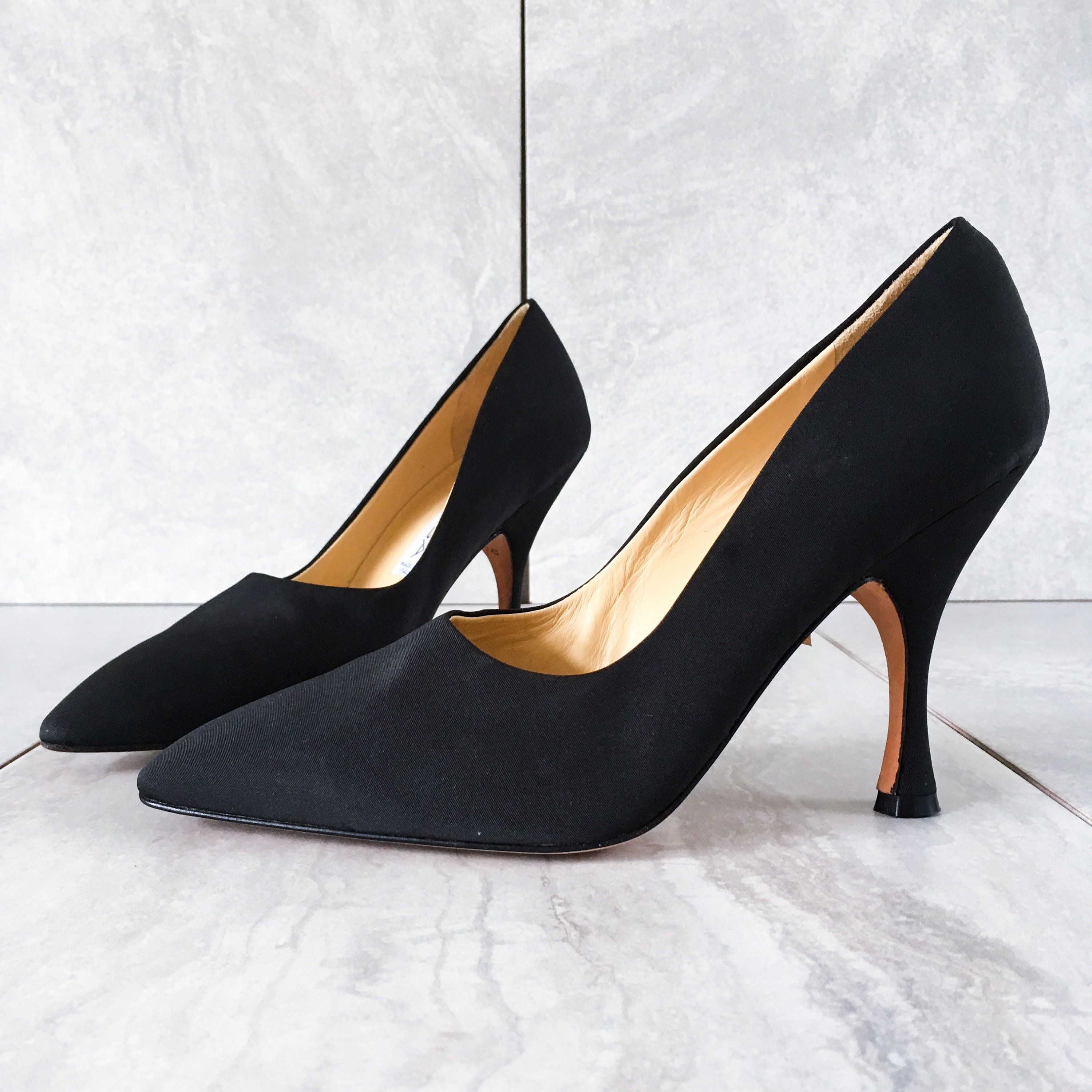 black silk pumps