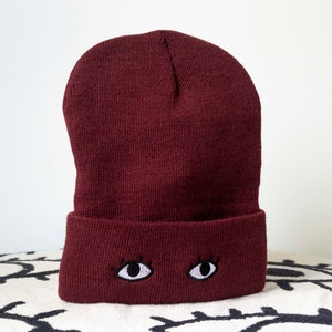 Knit Beanie Cap with Eyes Goldenbeets Embroidered Warm Cozy Hat One Size Fits All Maroon