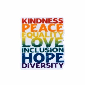 May include: A white sticker with the words "Kindness", "Peace", "Equality", "Love", "Inclusion", "Hope", and "Diversity" written in rainbow colors.