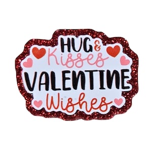 May include: A Valentine's Day-themed decoration with a red glitter border. The white center features the words "Hugs & Kisses Valentine Wishes" in a mix of black, pink, and red fonts, along with heart illustrations.