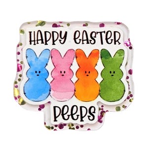 May include: A decorative Easter-themed badge featuring four colorful Peeps bunnies: blue, pink, orange, and green. The text "HAPPY EASTER PEEPS" is displayed in black, with a glittery border.