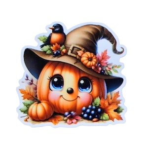 May include: A whimsical Halloween-themed sticker featuring an orange pumpkin with big blue eyes, a smiling face, and a brown witch hat. A small bird sits atop the hat, surrounded by fall leaves and pumpkins.