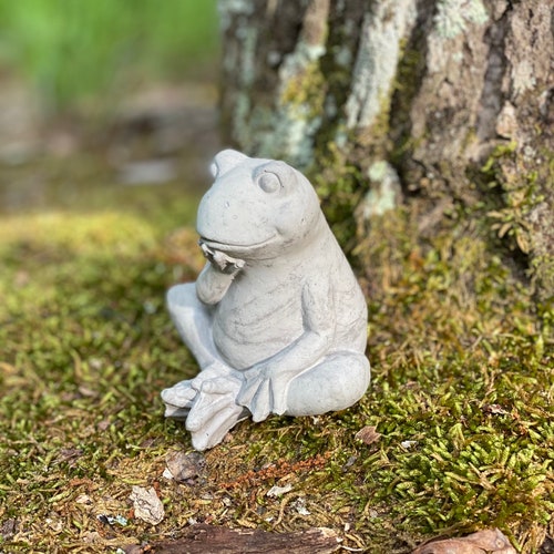 concrete frog statue