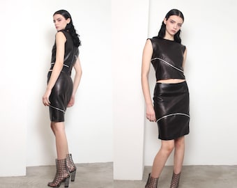 Conjunto de falda y top con cremallera de piel napa negra suave de Gianni Versace, otoño/invierno 1998.