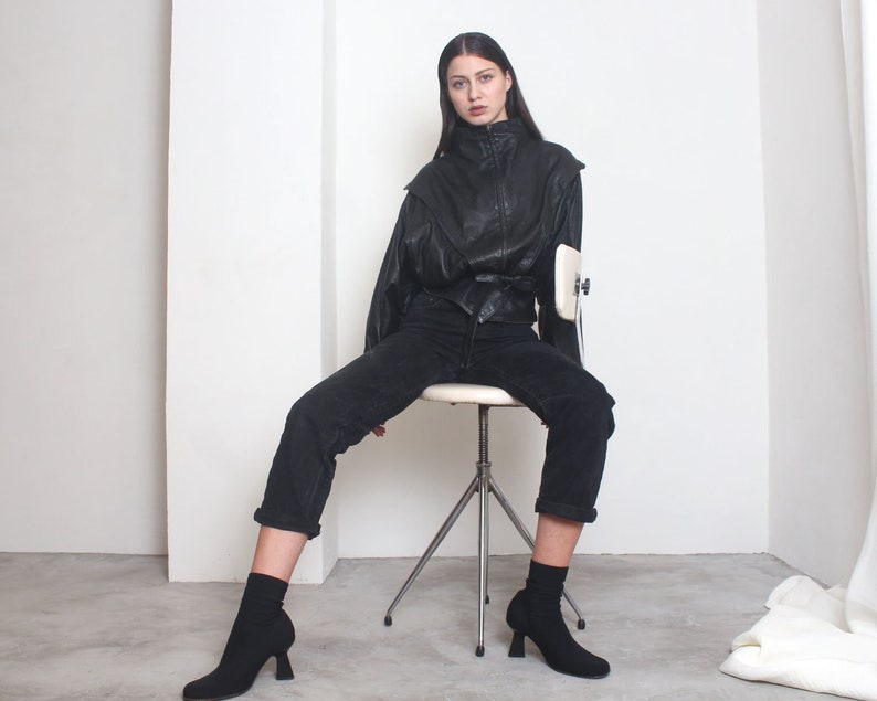 80s black futuristic avant garde batwing bomber jacket