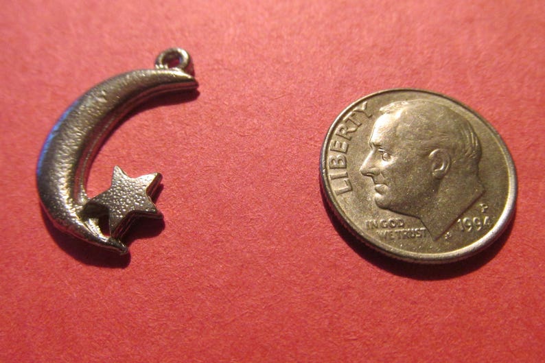 Twenty Pewter Crescent Moon And Star Charms