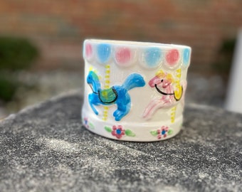 Vintage handpainted ceramic planter with carousel horses