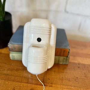 Vintage Art Deco white porcelain light switch, wall sconce for bathroom