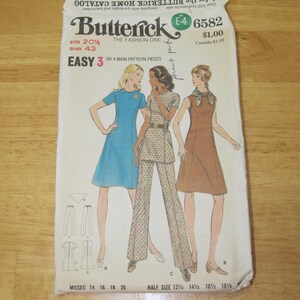 May include: Vintage Butterick sewing pattern envelope featuring illustrations of three women in dresses and a pantsuit. The envelope is cream-colored with text and the number 6582. The size is 20 1/2, bust 43.