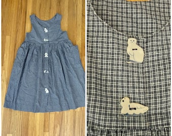 1970s vintage girls' apron dress with animal shaped buttons