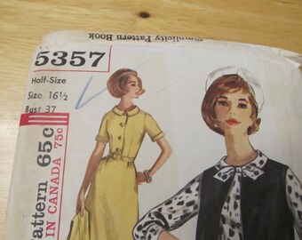 May include: Vintage Simplicity pattern book, featuring a yellow dress illustration with a button-down design, short sleeves, and a belt. The pattern number is 5357, with size 16 1/2 and bust 37. The cover also shows a woman in a black vest.